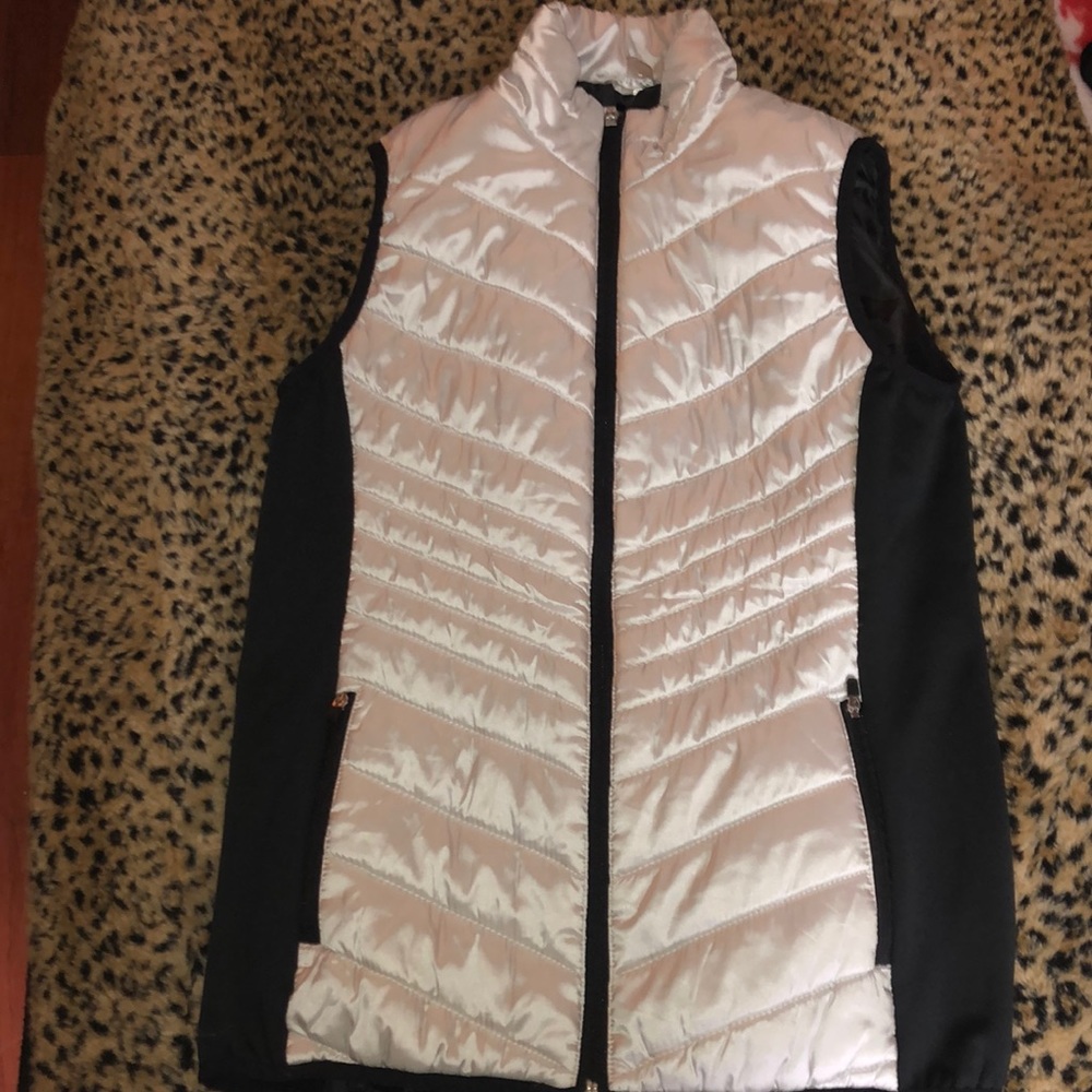 Xersion silver and black puffer vest.
